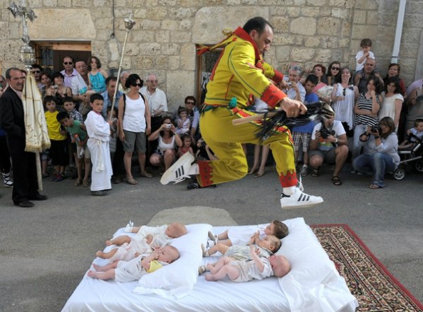 Baby jumping at El Colacho festival, Spain